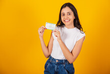 Beautiful Brazilian Woman Holding Voter Registration Card.