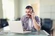 © BillionPhotos.com - Smiling young business man employer in office