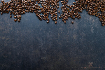 Wall Mural - Coffee beans on wooden old background