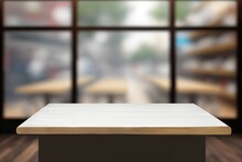 Empty Table With Wooden Board In Front Of A Fuzzy Background. You Can Use This Perspective Shot Of Brown Wood Over A Blurred Coffee Shop To Showcase Your Wares. Model Used In Place Of The Real Thing I