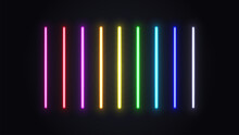 A Set Of Neon Glowing Lamps. Bright Multicolored Lasers On A Dark Background.