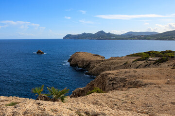 Wall Mural - View over cliffs and wild coastline in Cala Gat near Cala Rajada, Mallorca, Spain