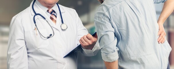 Poster - The doctor examines young patient about symptoms.