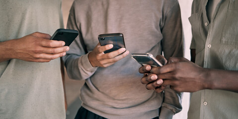 Poster - Man, hands and phone of people networking on social media, mobile app or chatting together. Hand of men holding smartphone texting or typing for online network share, data sync or communication