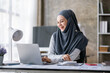 © David - Excited muslim woman sit at desk feel euphoric win online lottery, happy black woman overjoyed get mail at tablet being promoted at work, biracial girl amazed read good news at computer