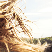 A Girl's Hair Fluttering In The Wind