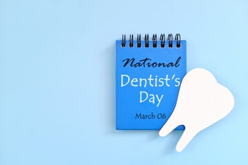 Wall Mural - March 6 as National Dentist Day date reminder on blue desk calendar. Celebration concept.