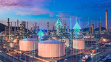 Fototapeta Kawa jest smaczna - Oil​ refinery​ with oil storage tank with price graph and petrochemical​ plant industrial background at twilight, Aerial view oil and gas refinery at twilight.