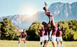 © Anela R/peopleimages.com - Team, ball or rugby men lifting a man together in training, exercise or workout match on sports field. Jumping in air, line out or powerful group in competitive game with physical fitness or effort