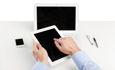 Poster - Man hand working on a digital tablet with blank screen monitor