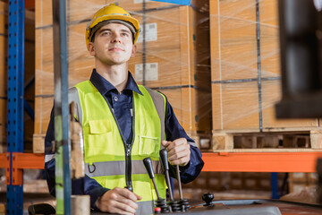 Caucasian male worker working in warehouse goods store. inventory staff moving products pallet shipping management with forklift lift truck.