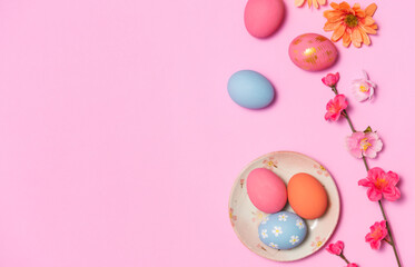 Wall Mural - Happy easter Colourful of Easter eggs on pink background. Greetings and presents for Easter Day celebrate time. Flat lay ,top view, copy space.