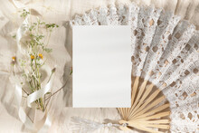 Invitation Card Mockup With Fan And Wild Flowers 