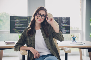 Wall Mural - photo of smiling charming lady programmer wear eyeglasses finish work modern device indoors workplac