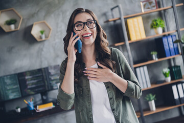 Wall Mural - photo of funny funky lady secretary wear eyeglasses laughing speaking modern gadget indoors workplac