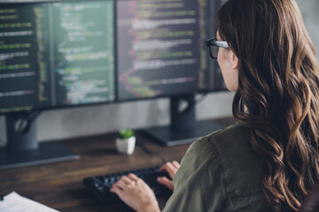 Wall Mural - cropped rear photo of smart web designer keyboard writing two monitor screens office building indoor