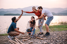 Happy Friends Meeting At Campground, Group Of Diverse People Enjoy Camping With Friends At Campyard On Vacation