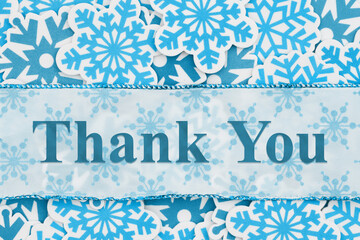 Wall Mural - Thank you message on banner with blue snowflakes