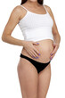 © Nobilior - Pregnant woman posing against white background, isolated