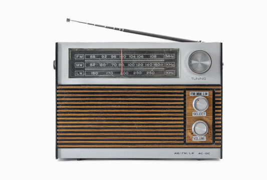 authentic 70s radio receiver. front view. isolated on white background. traces of time and scuffs on