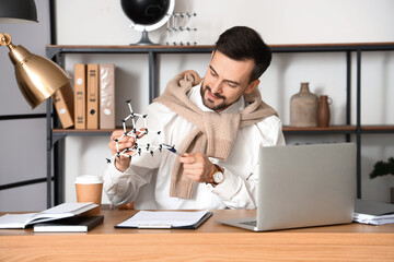 Sticker - Male tutor with molecular model giving online Physics lesson at home