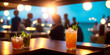 Alcoholic cocktails long drink resting on a bar counter, defocused background of beach cafe, unrecognizable people. AI generated