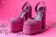 Fashionable punk square toe ankle strap pumps and confetti on pink background. Shiny party platform high heeled shoes
