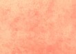 © Khomkrit - light red or beige watercolor background Primed with rough human skin tones. Pastel watercolor primer. Light red. For banners, posters. Natural color.