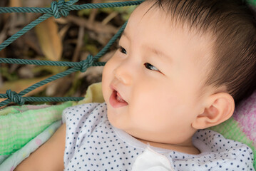  Close up on face of cute baby boy smiling