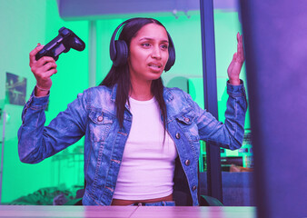 Aufkleber - Gamer, headphones and sad woman on computer in home at night in neon light for web esports. Gaming loser, cyber technology or upset female with controller for online games, video game or internet app