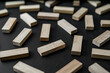wooden blocks on a dark background, text to write. Jenga blocks.
