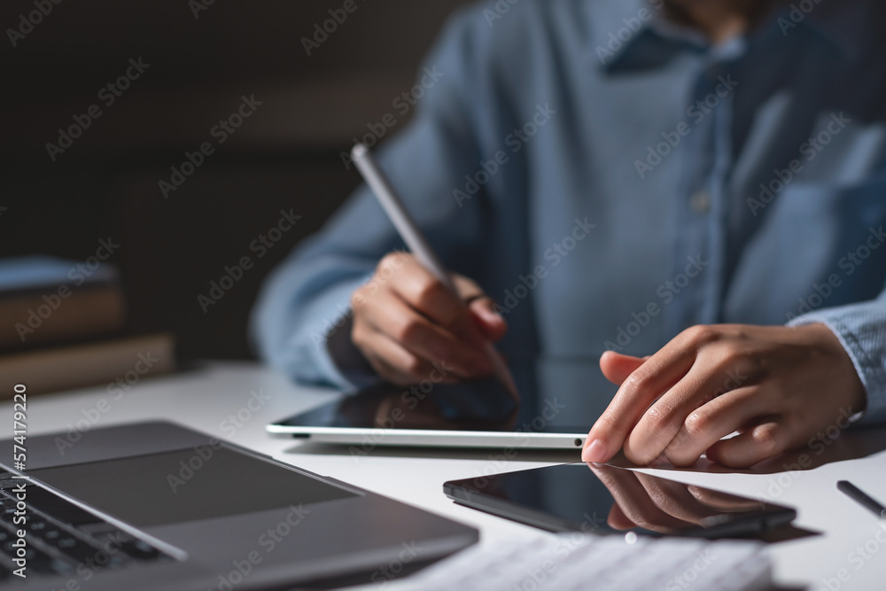 Hands of student using tablet and electronic pen. education e-learning concept.