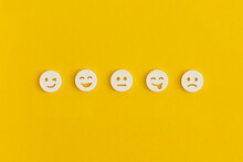 Emoticon Smile On A Yellow Background. Customer Feedback.