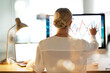 © Lumeez/peopleimages.com - Woman, computer or screen hologram for data analytics in night office for financial planning or company budget. Chart, business or 3d infographic abstract on technology for finance accountant