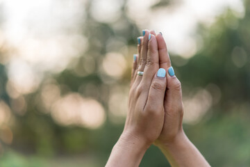 Asia woman Praying hands with faith in religion.