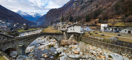 Wall Mural - most beautiful Alpine villages of northern Italy- Lillianes, medieval borgo in Valle d'Aosta region, aerial drone view.