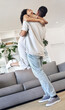 © Allistair F/peopleimages.com - Excited couple, hug and jump with love in new house, real estate and apartment lounge. Happy homeowners hugging to celebrate in living room, property investment and dance with care, fun and happiness