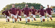 © Anela R/peopleimages.com - Rugby, sports and a team of men portrait doing lunges for training or competition game on a field. Fitness, sport and stretching with diversity athlete group in a warm up before an outdoor match