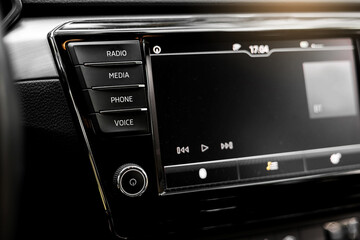 Modern car dashboard. Smart screen multimedia touchscreen system for automobile. Interior details of prestige modern vehicle