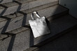 Tote bag mockup template on a concrete ladder with deep sunlit shadows. Isolated surface to place your design.