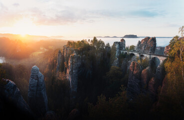 Sticker - Beautiful panoramic view of Bastei Bridge (Basteibrucke) at sunrise with fog - Saxony, Germany