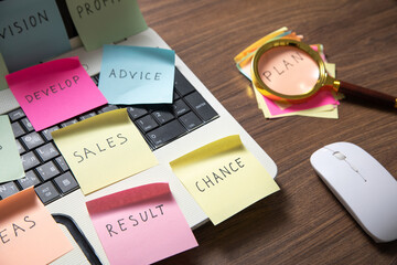 Sticker - Laptop computer with colorful sticky notes. Business