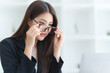 © M+Isolation+Photo - Attractive asia busy business woman consultant auditor working at modern office with balance sheet accounting bookkeeping documents. Account verification to prevent fraud bribery.