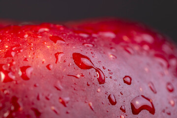 Red peel of a ripe and juicy apple