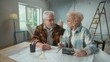 Elderly man and woman are calculating expenses of repairing an apartment on calculator. Aged couple is planning the improvement of their home. Concept of repair, decoration, interior design.