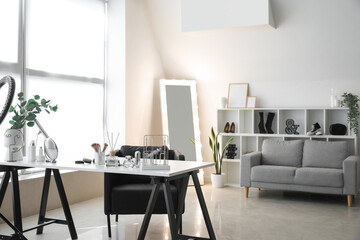 Sticker - Interior of light makeup room with table, mirror and sofa