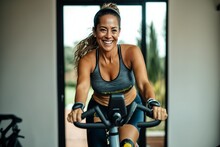 Pretty Mature Active Fit Smiling Hispanic Woman On A Bicycle In Gym Or At Home, Training On Exercise Bike Indoors, Looking Happy And Healthy, Long Hair Tanned Skin Senior Lady, Made With AI Generative