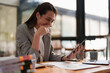 © itchaznong - Beautiful business woman analyze fund investment. Business Consulting, Accounting, finance investment concept.