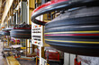 © nordroden - Raw automobile tires along production plant storage