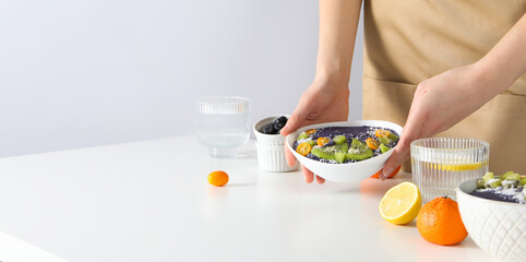 Wall Mural - Concept of healthy food with acai smoothie, space for text